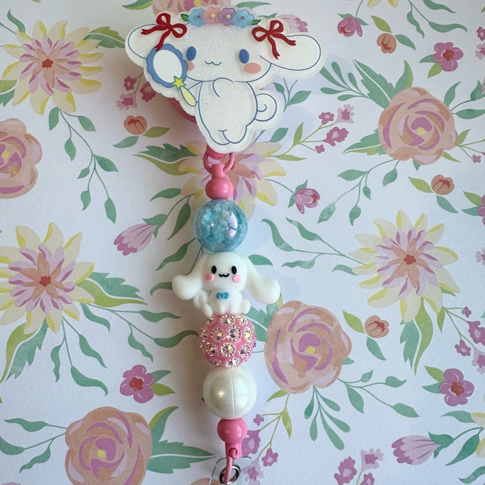 Charming Cinn Badge reel with Pink and White Accents